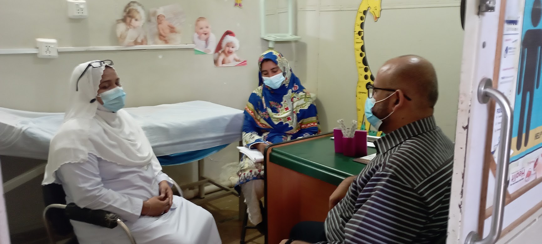 Dr. Shiyam meeting with nurse